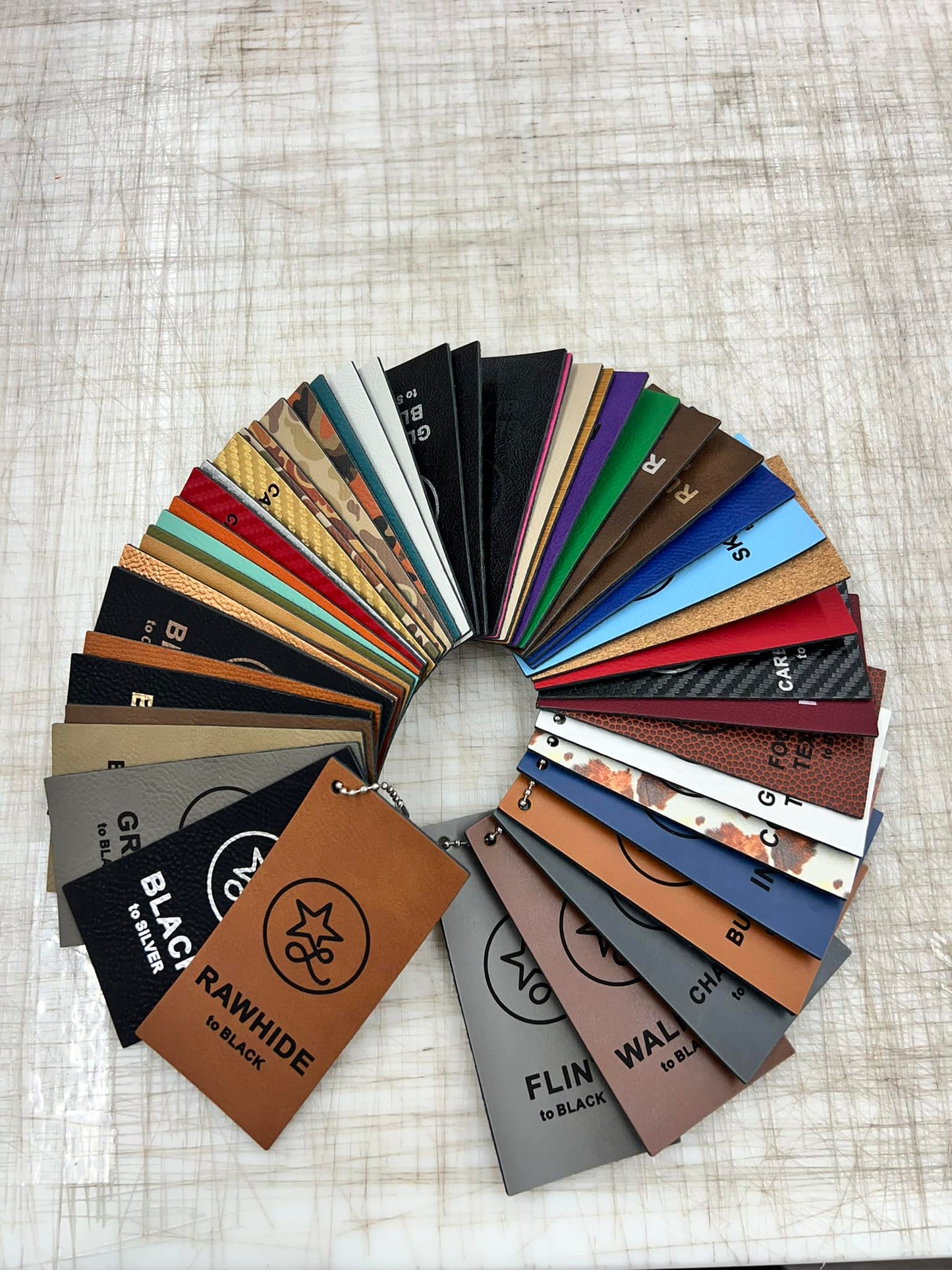 Custom leatherette patch with adhesive backing